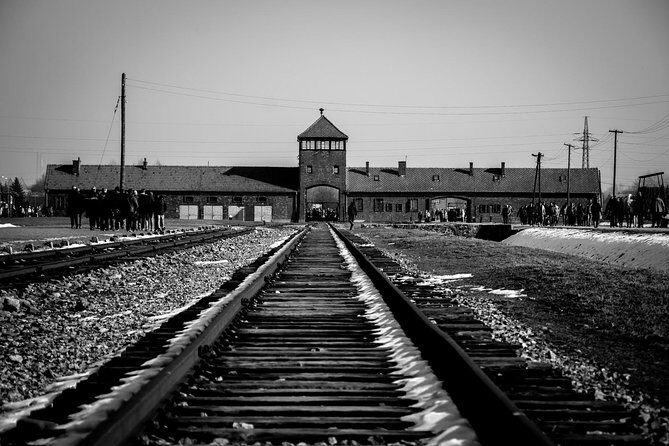 Auschwitz Birkenau Guided Tour with Ticket Hotel Pickup Small Van - Headsets and English guidance: how the tour stays understandable