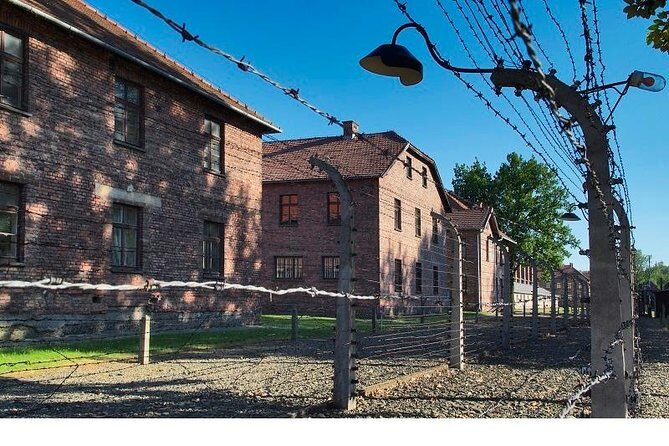 Auschwitz-Birkenau Museum and Memorial Guided Tour from Krakow - Birkenau II: crematoriums, gas chamber areas, and the memorial walk feel