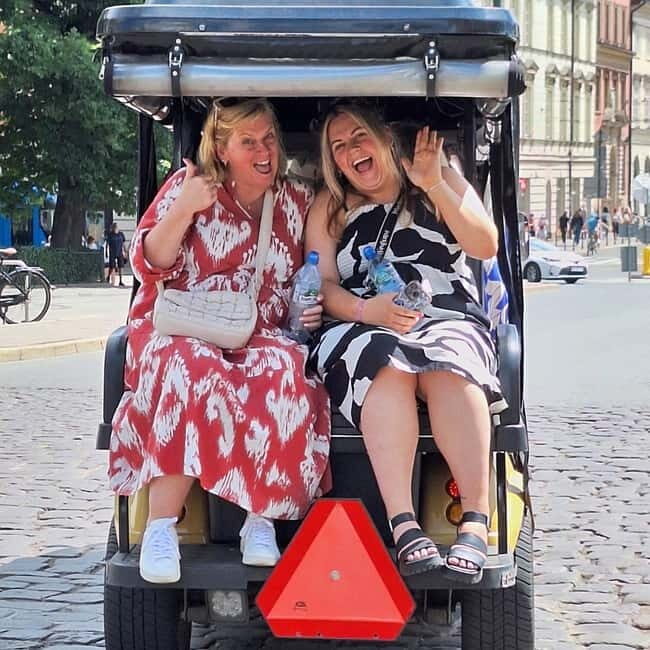 City Tour Cracow golf car plus Cruise on the Vistula River. - Wawel Views and Stopping at the Castle Bluff Area