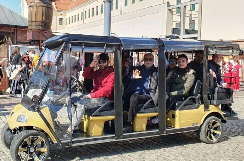City Tour Cracow golf car plus Cruise on the Vistula River. - Podgórze and the Ghetto-Area Stops: Schindler’s Factory Included