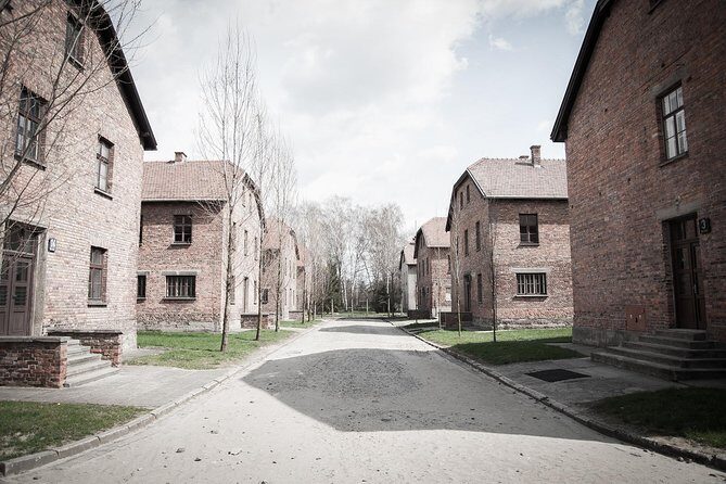 Combined: Auschwitz Birkenau and Salt Mine private chauffeur from Krakow - Entering Auschwitz-Birkenau: guided layout, headphones, and focus time