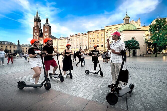 Electric Scooter Tour: Old Town Tour - 2-Hours of Magic! - Rain happens: what the raincoat inclusion changes