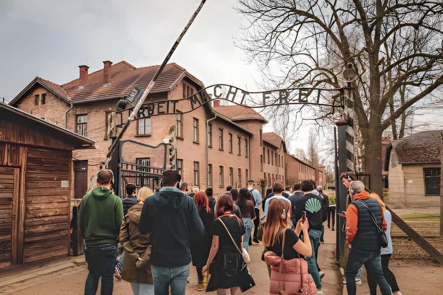 From Krakow: Auschwitz & Birkenau Guided Tour with Pick up - Auschwitz I: starting at the gate and moving through prison blocks