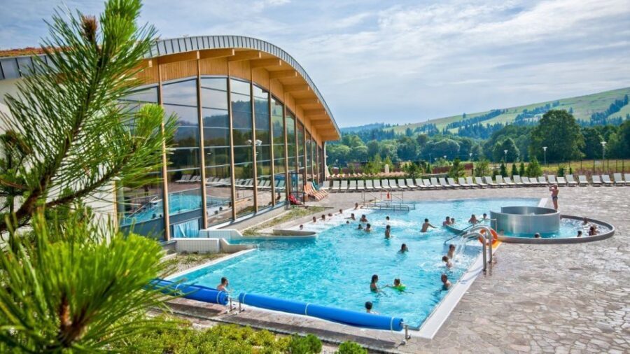 From Kraków; to Białka Thermal Baths private tour - Loud Zone with 5 thermal pools and outdoor slides: family fun that still works