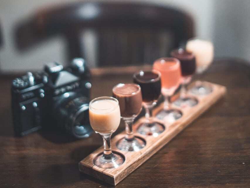 Kraków: Guided Vodka Tour with Food and Drink Tastings - Candlelit bar with 100+ varieties: the point of obsession