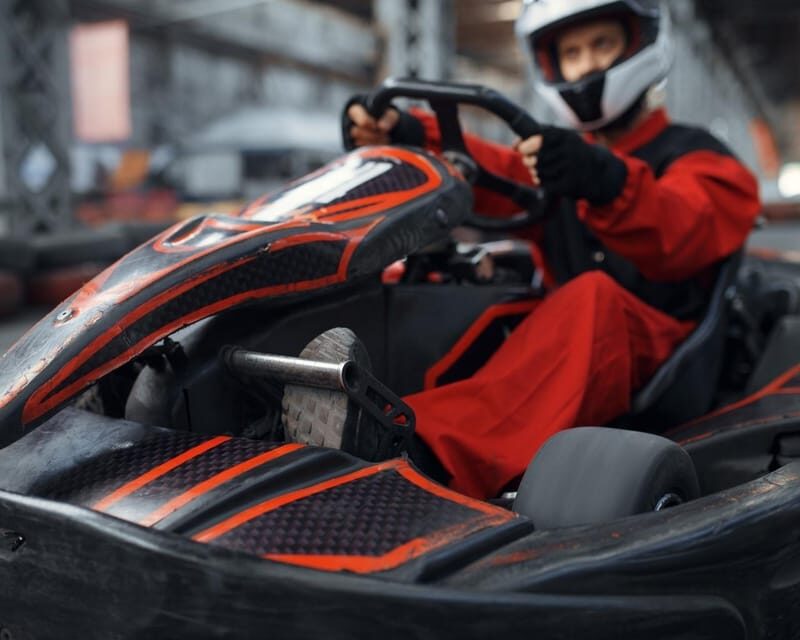 Krakow: Indoor Go-Karting (24-Minute Races) - Gear up right: helmets, balaclava, and the safety rhythm