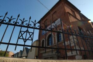 Krakow: Jewish Quarter Guided Walking Tour - Szeroka Street and the cobblestone streetscape you can actually feel