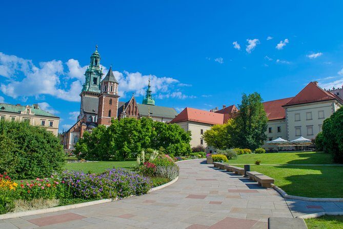 Krakow: Skip-the-Line Wawel Castle & Old Town Guided Tour - Entering the Royal Route: Royal Staterooms and Preserved Interiors