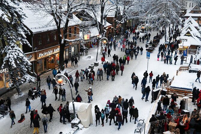 Krakow: Zakopane Tour, Thermal Springs, Cable Car & Hotel Pickup - Chocholów wooden village stops: short visits, big photo payoff