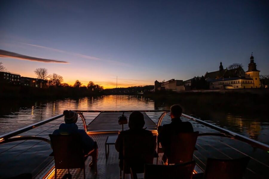 Picturesque Cruise on the Vistula in the Heart of Krakow - Wawel from the water: defensive walls, cathedral views, and the dragon